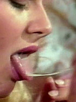 Two classic ladies sharing a cock till it erupts his load