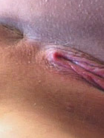 Beautiful teen shoving a pink dildo in her tight wet pussy