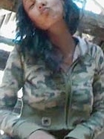 Latina cutie stripping for camera and showing her bald pussy