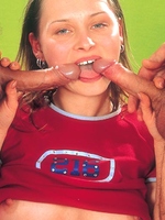 Teenage brunette girl loves to suck two big cocks at once