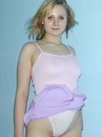 Teenage brunette camgirl pulling up her white sexy thong