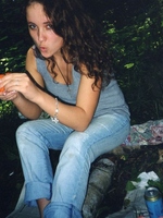 Brunette teenage camgirl showing her sexy and firm body