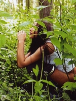 Teenage brunette girl using a weird skippybal dildo to play