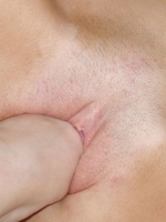 Teenage girl sticks her foot in the other her tight pussy