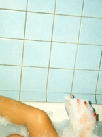 Sexy teenage brunette webcamgirl spreading her long legs